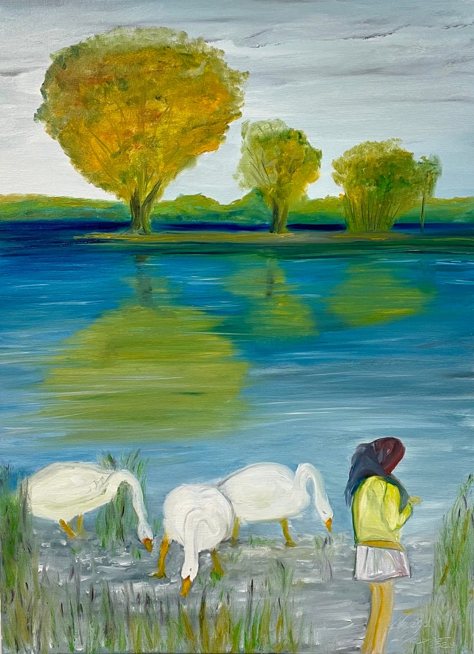 Mädel füttert Schwan